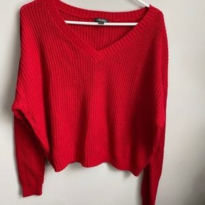 red v neck sweater